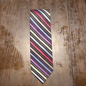Elegant Striped Tie in Black, Blue, and Magenta